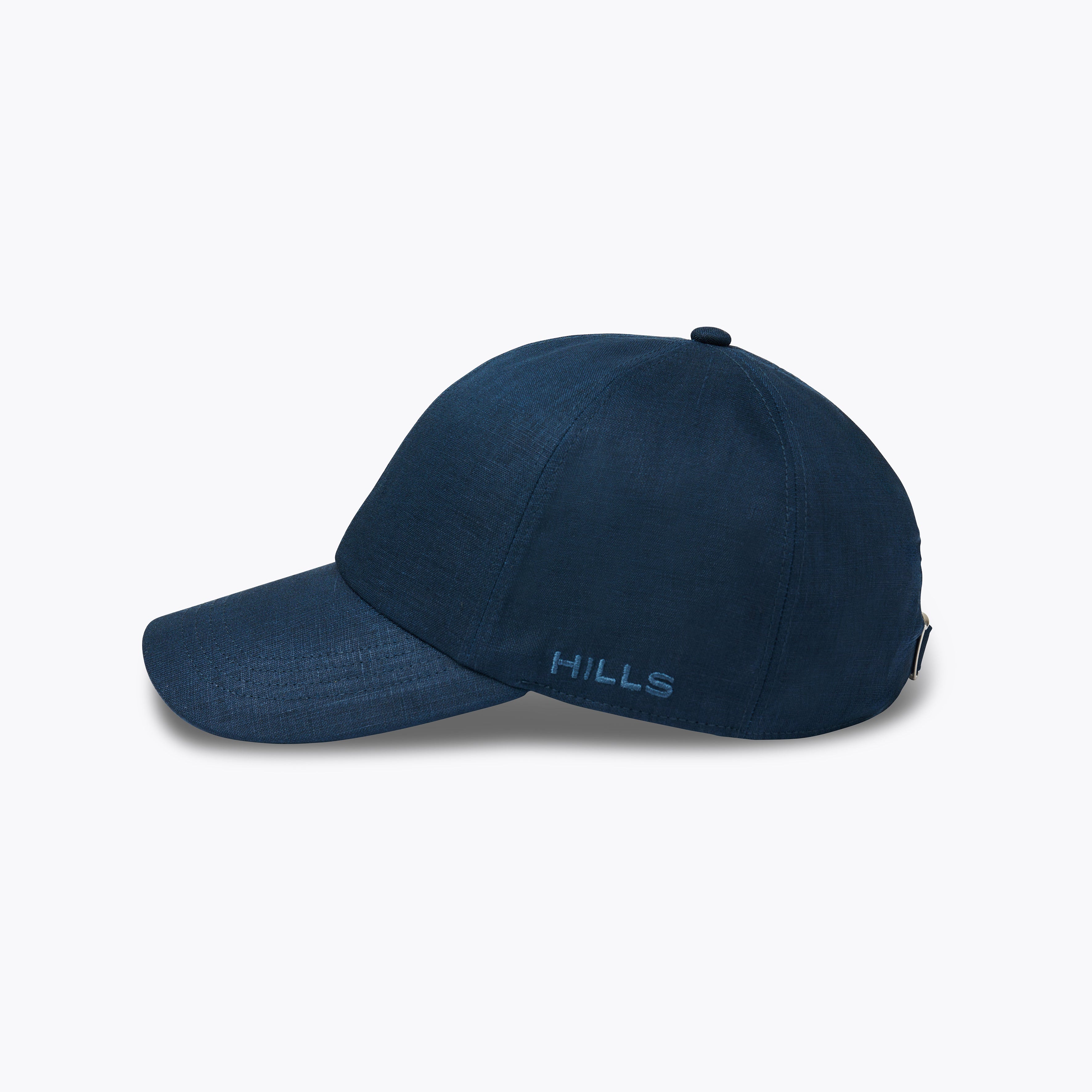 Navy blue cap with 'Hills' branding on a white background