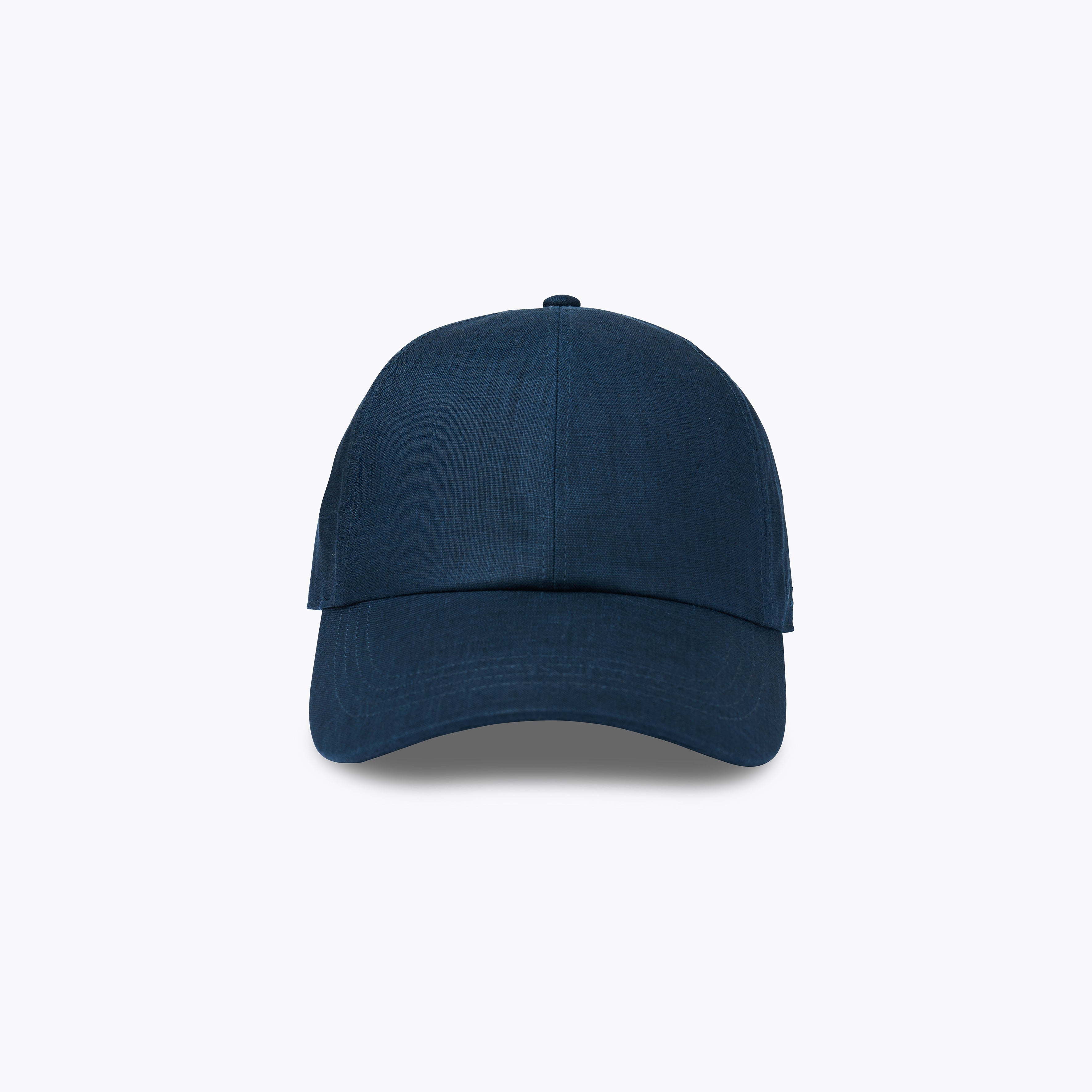 Navy blue baseball cap on a light gray background