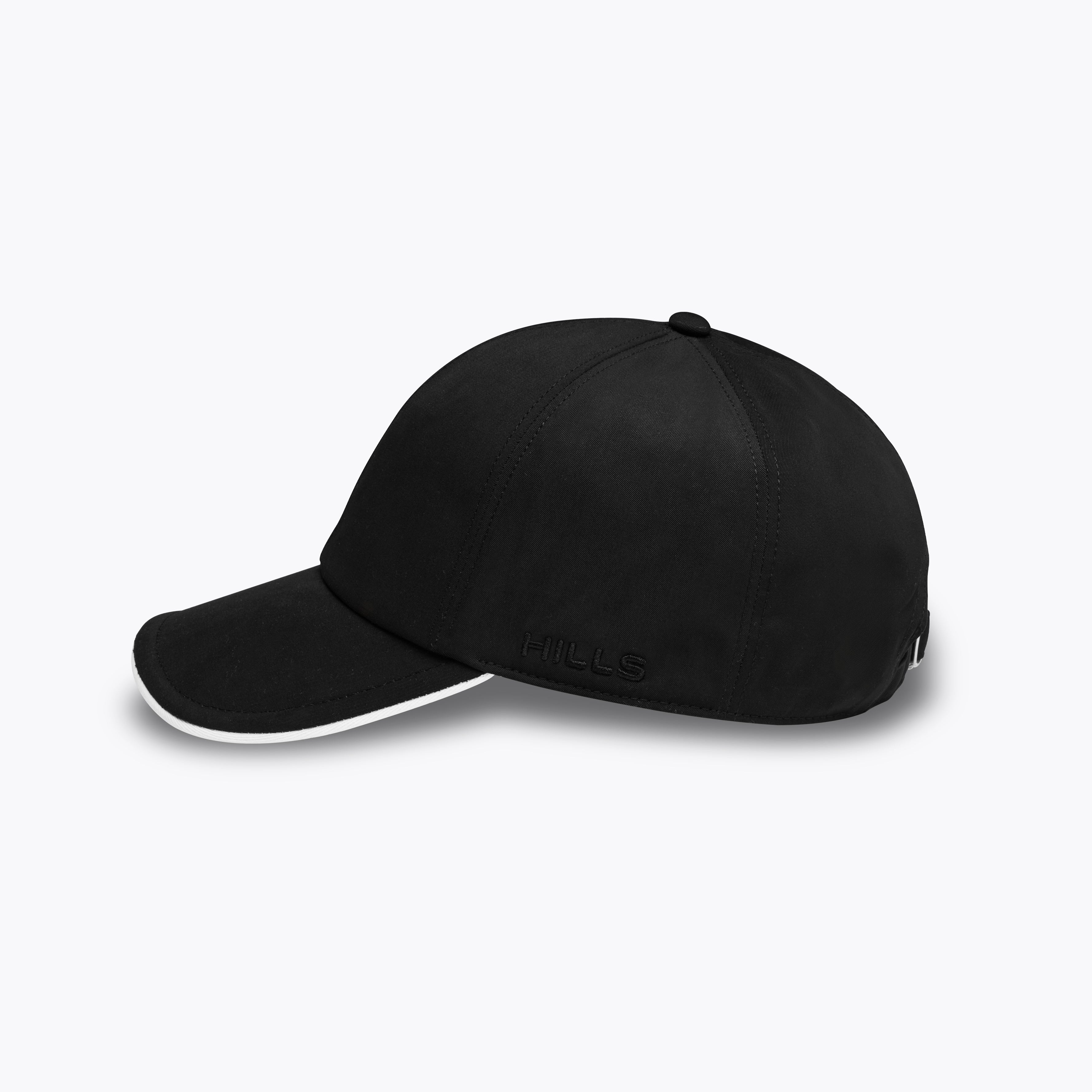Black cap with white trim on a white background